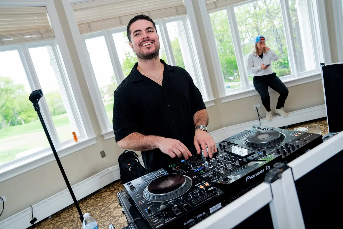 DJ performing inside the Royal Melbourne clubhouse at the Chicago Bowl
