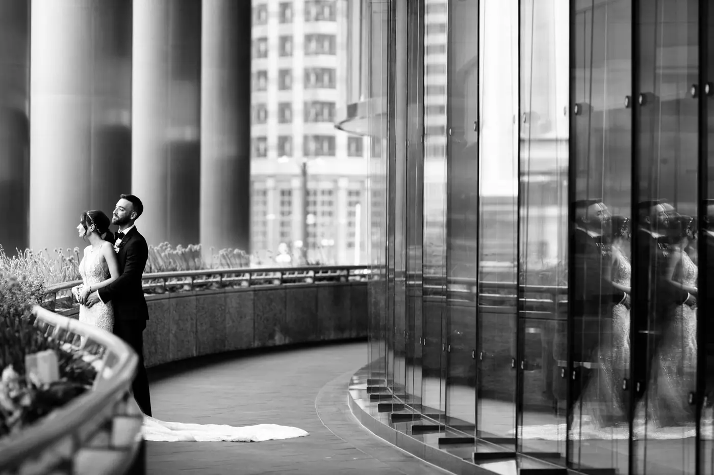 Black-and-white reflection portrait of Alexis and Michael