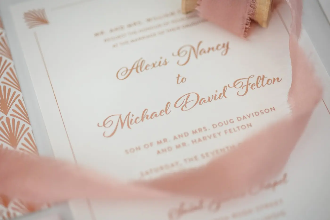 Rose-gold invitation detail for Alexis and Michael's wedding