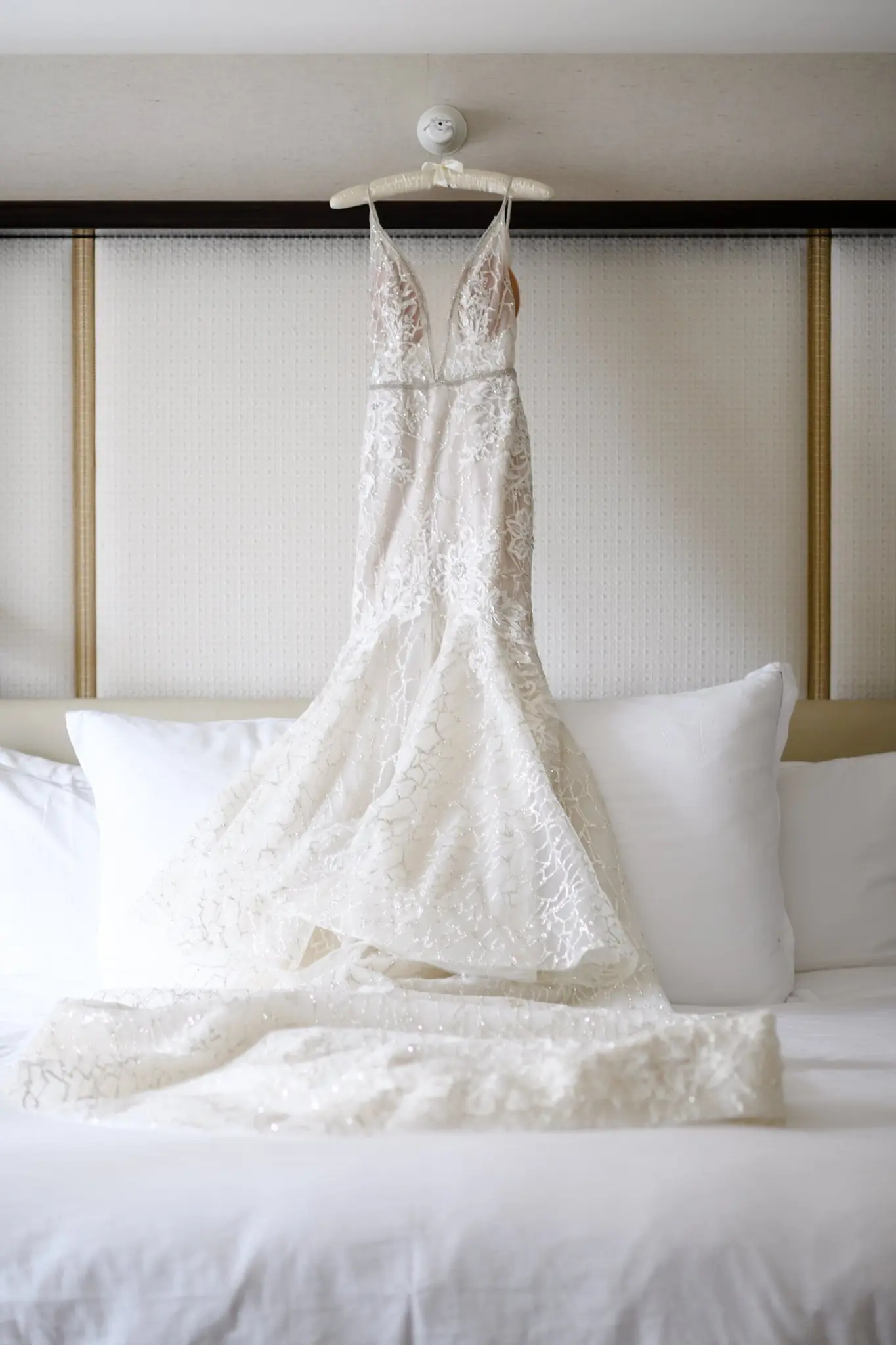 Alexis's wedding gown hung in the suite before the ceremony