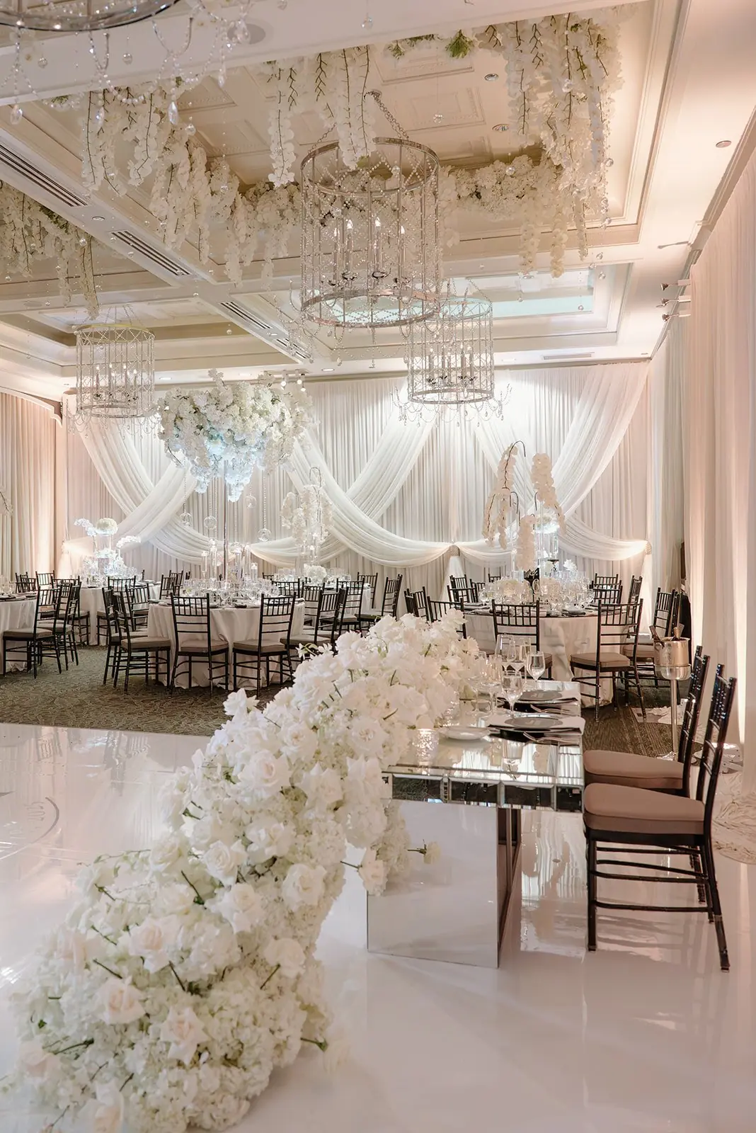 All-white ballroom reception for Gianna and Austin at the Waldorf Astoria