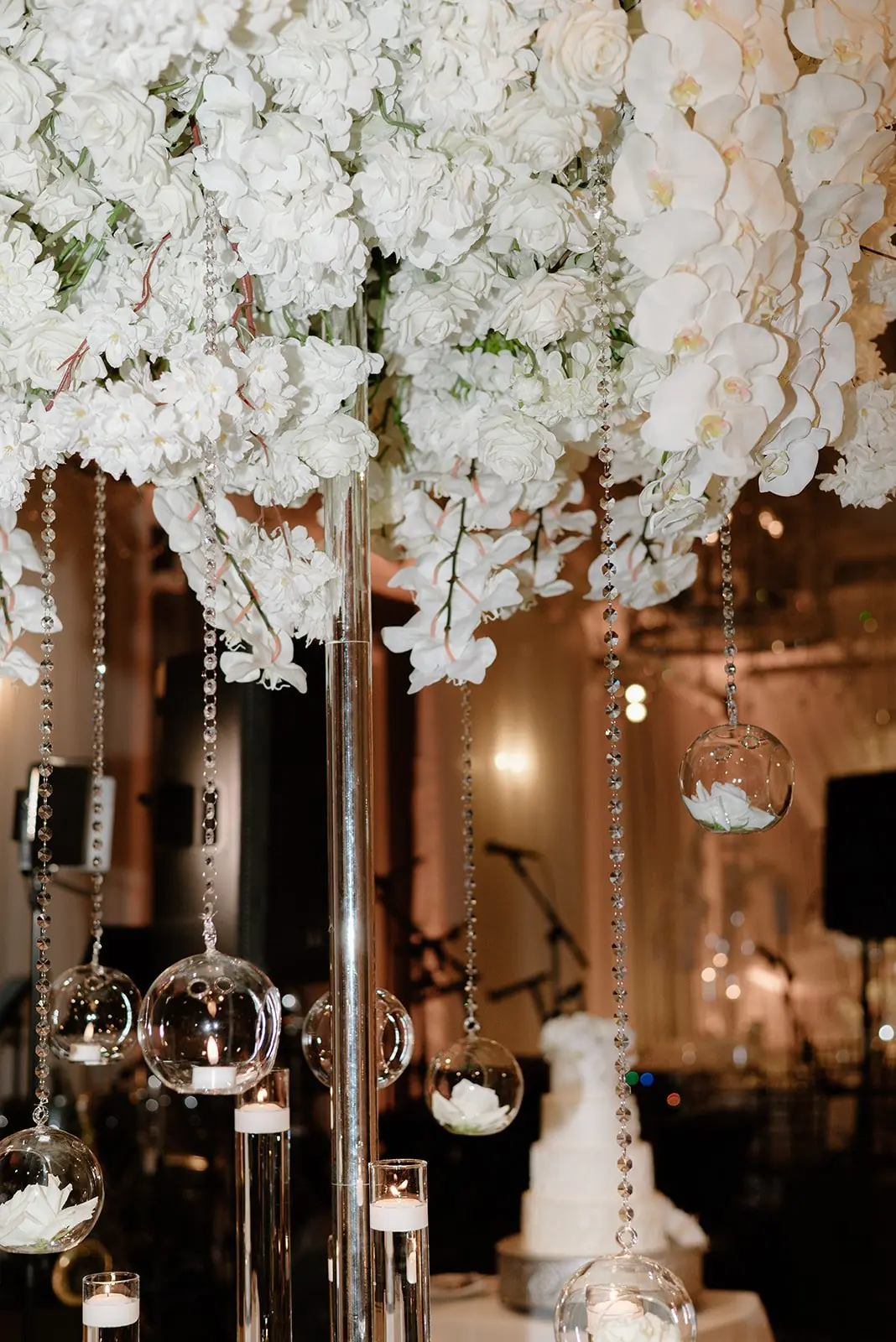 Crystal and orchid centerpiece at Gianna and Austin's reception