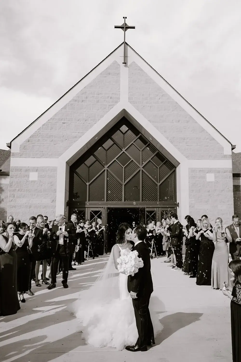 Gianna and Austin's bubble exit kiss after their Saint Patrick ceremony