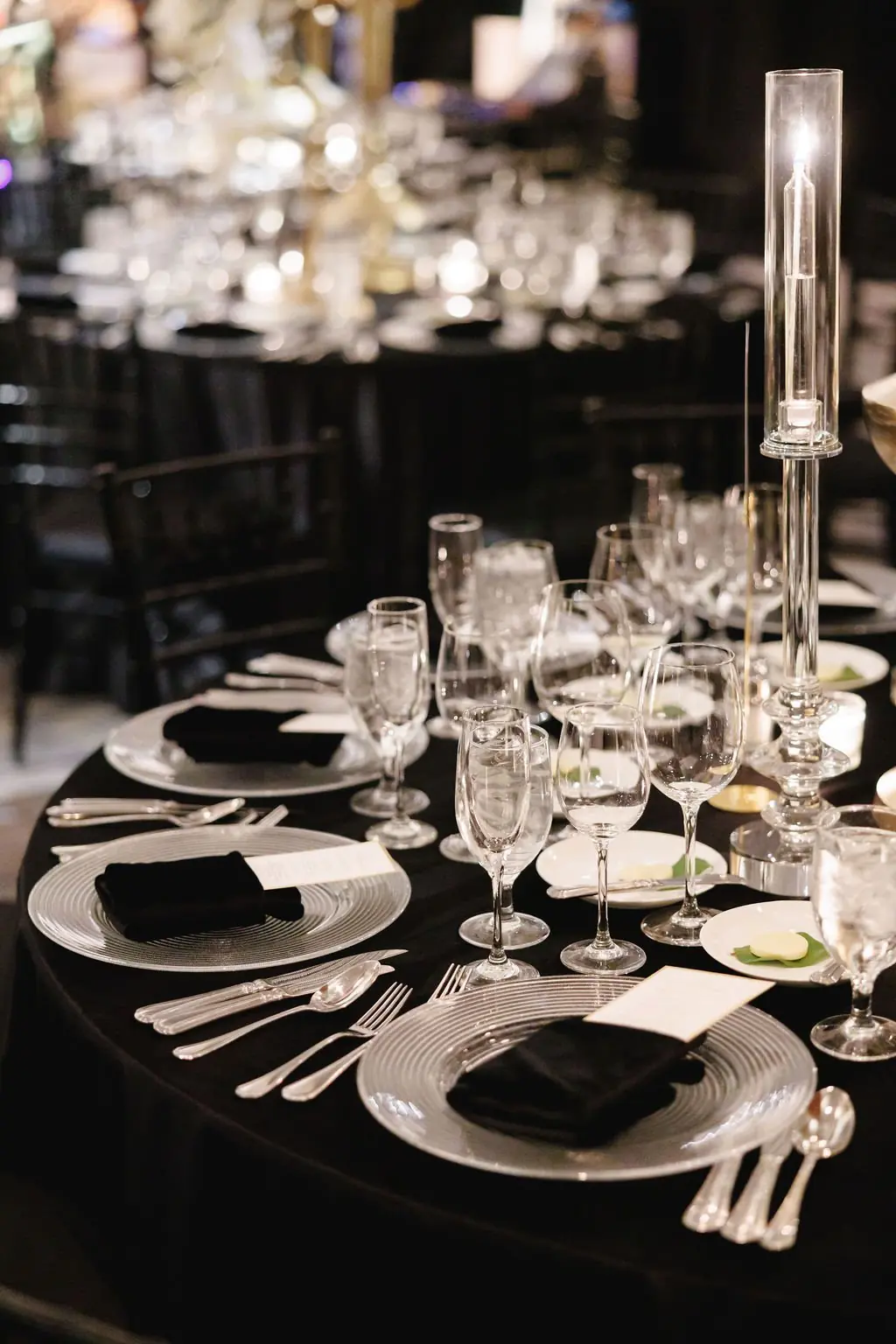 Black-tie place settings at Jackie and Joe's Ritz-Carlton reception