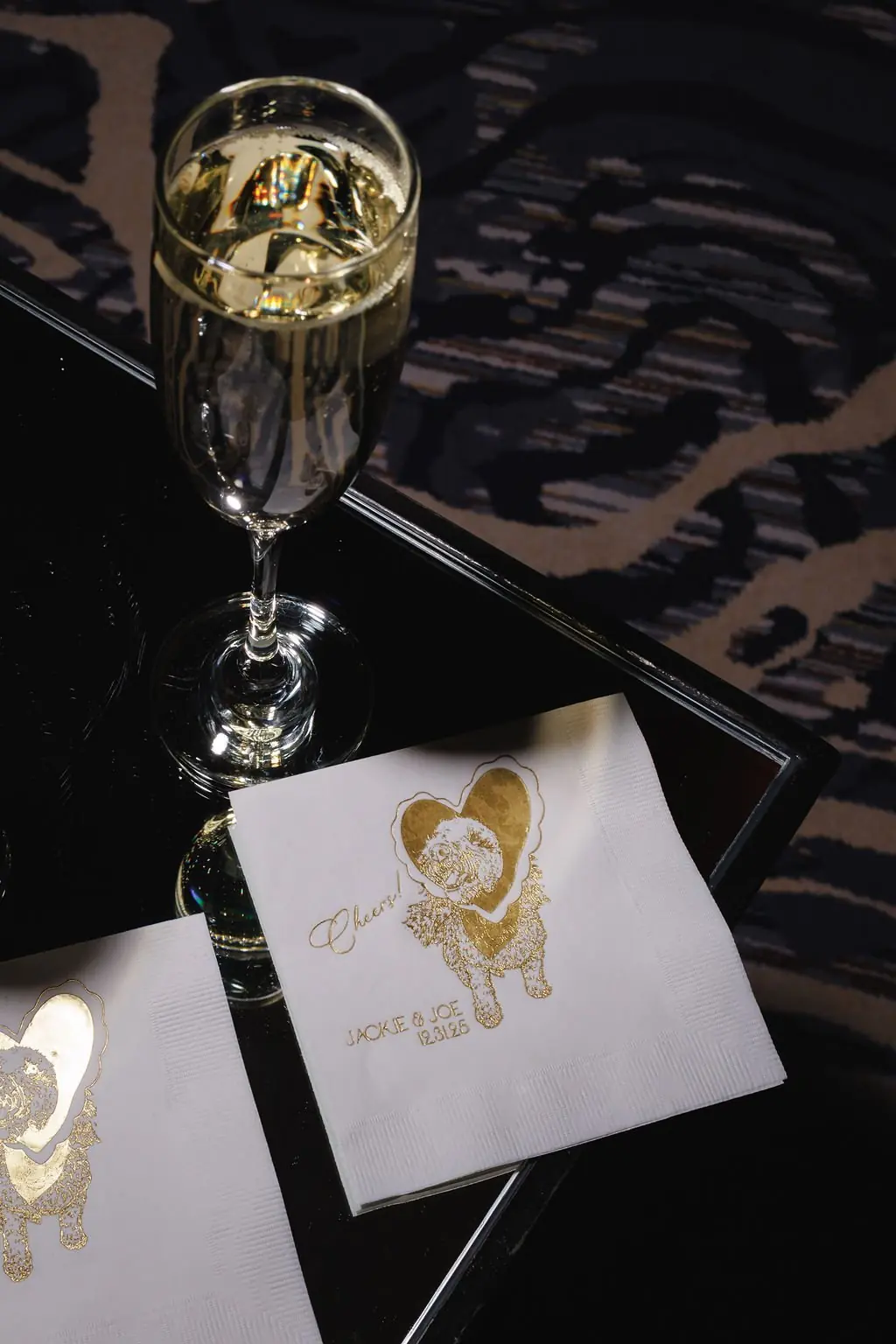 Jackie and Joe cocktail napkins with champagne