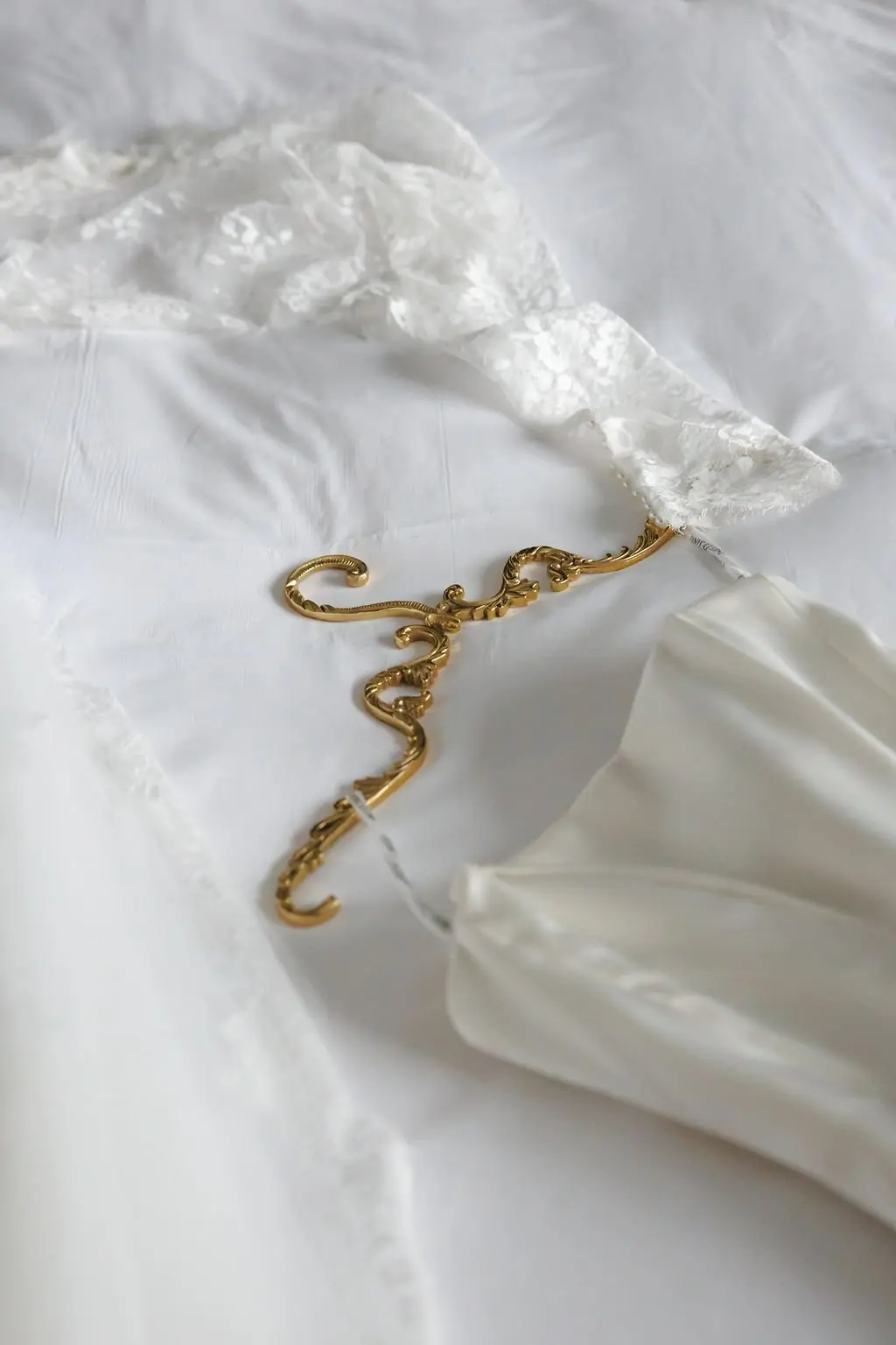 Bridal hanger and lace detail from Jackie and Joe's wedding morning