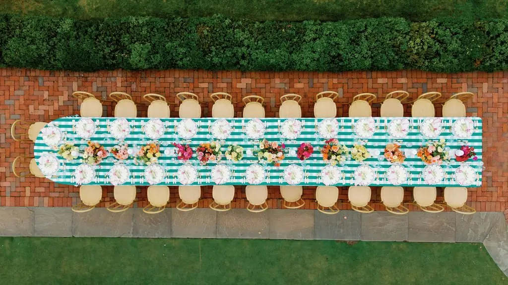 Overhead view of the long reception table at Lisa and Matt's Shoreacres celebration