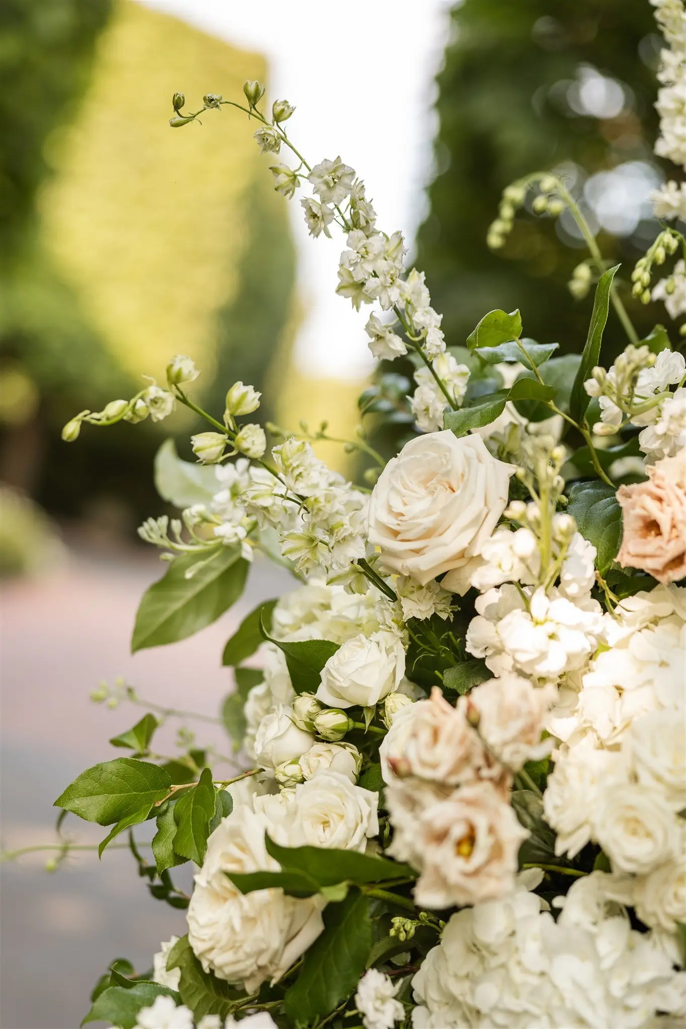 White and peach floral detail from Megan and Alex's wedding