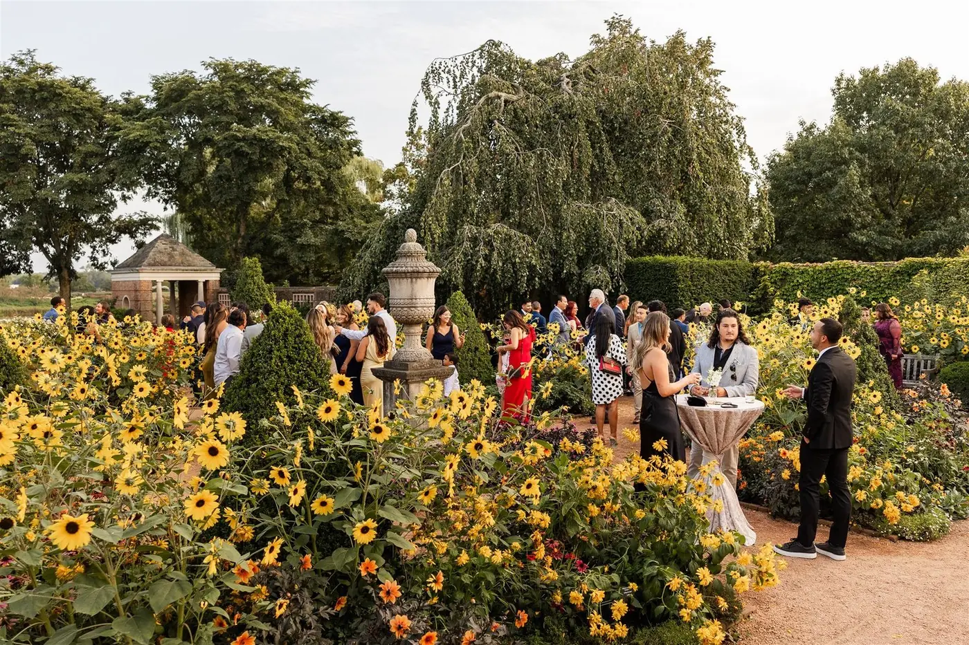 Cocktail hour among the gardens at Megan and Alex's wedding