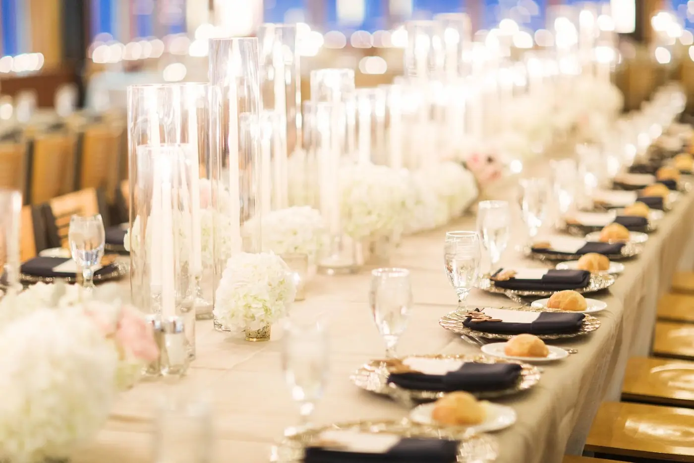 Candlelit banquet table at Rian and Matt's Park City reception