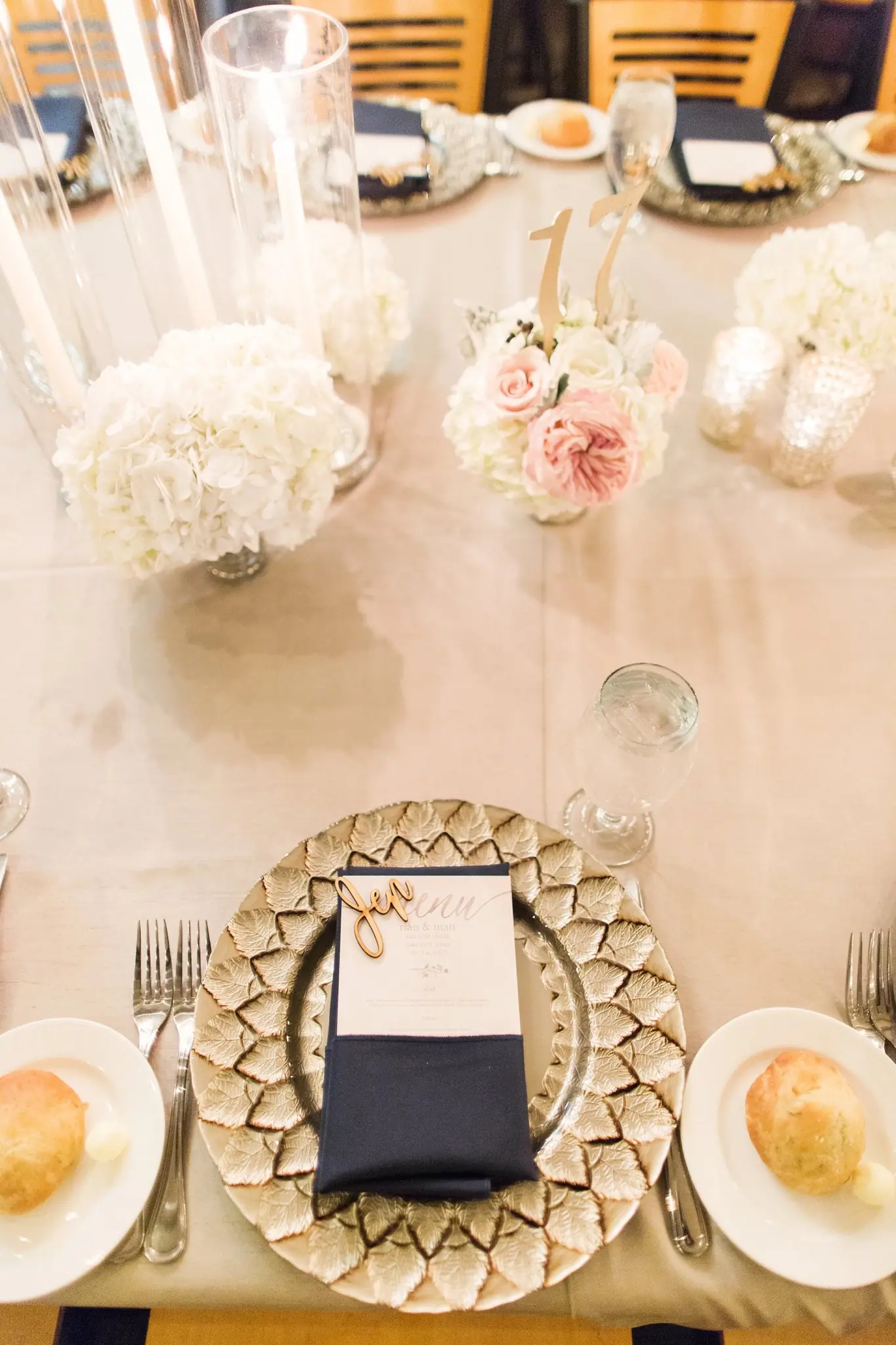 Jen place setting with gold charger at Rian and Matt's reception
